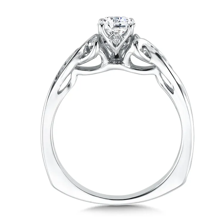 A continuous polished gold weave design with dainty diamond accents  showcases the dazzling center stone.