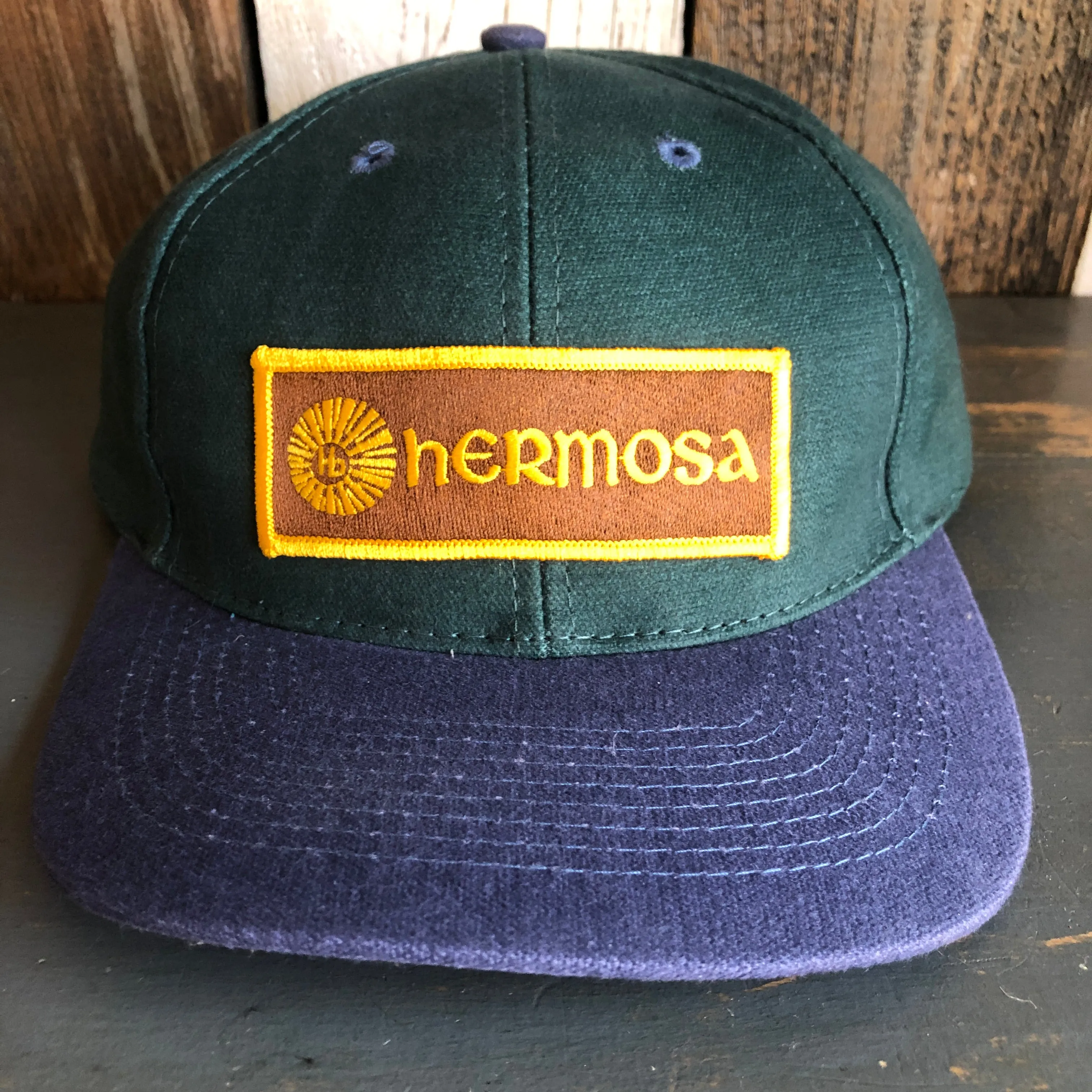Hermosa Beach AS REAL AS THE STREETS - 6 Panel Low Profile Baseball Cap with Adjustable Strap with Press Buckle - Dark Green/Navy